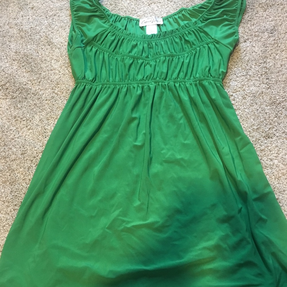 Green ruffled shirt